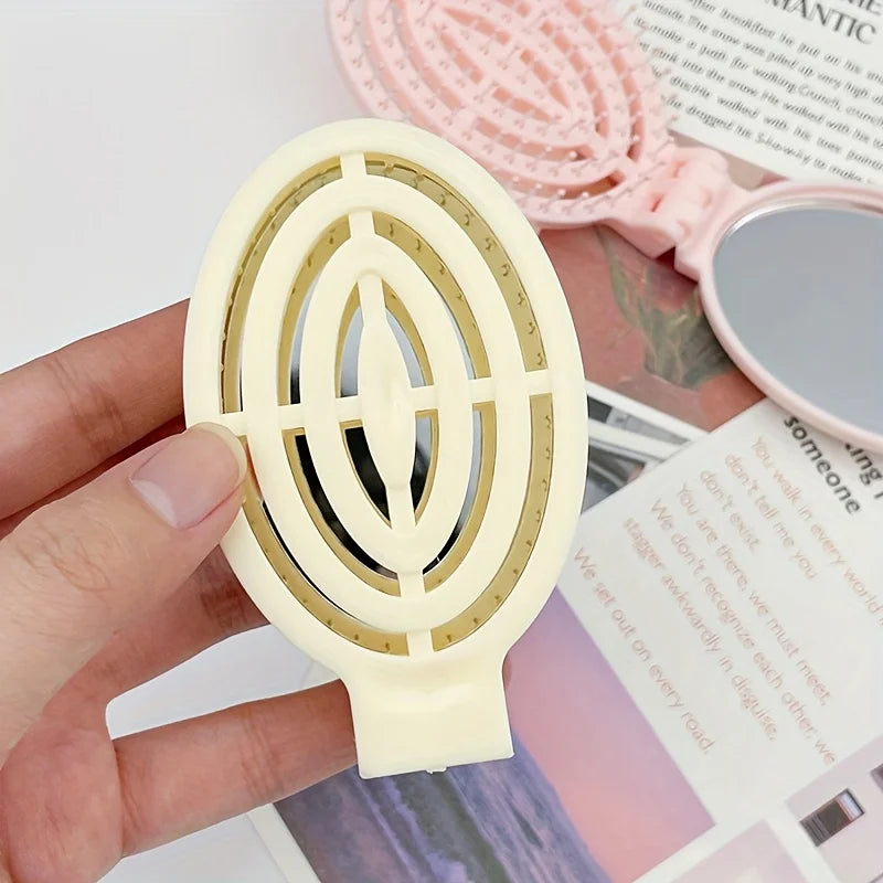 Sammenleggbar hårbørste med speil