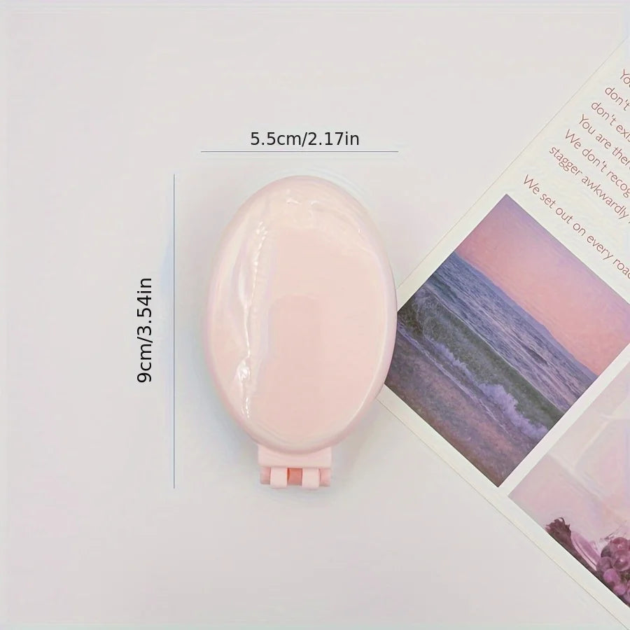 Sammenleggbar hårbørste med speil